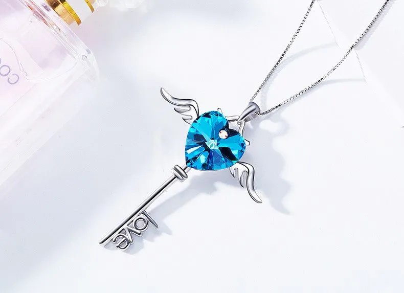 Sterling silver sapphire winged key necklace