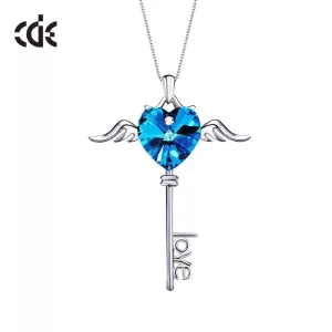 Sterling silver sapphire winged key necklace