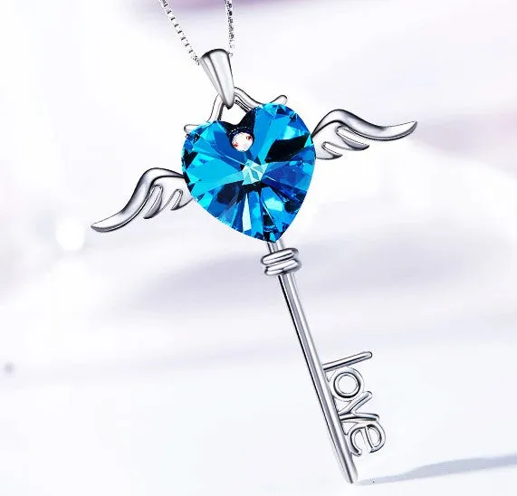 Sterling silver sapphire winged key necklace